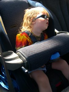 Asleep in a carseat.