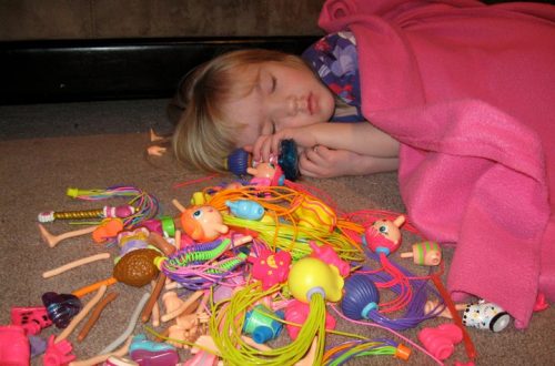 little girl with toys