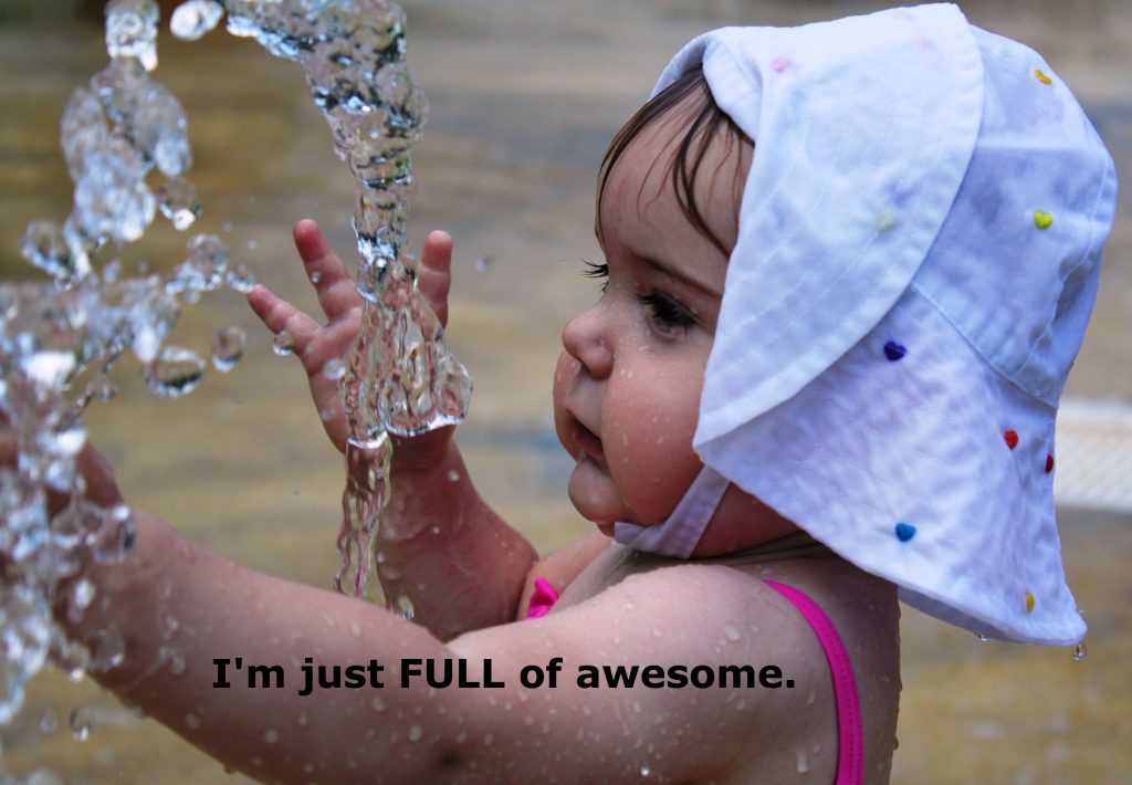 Picture of baby exploring water