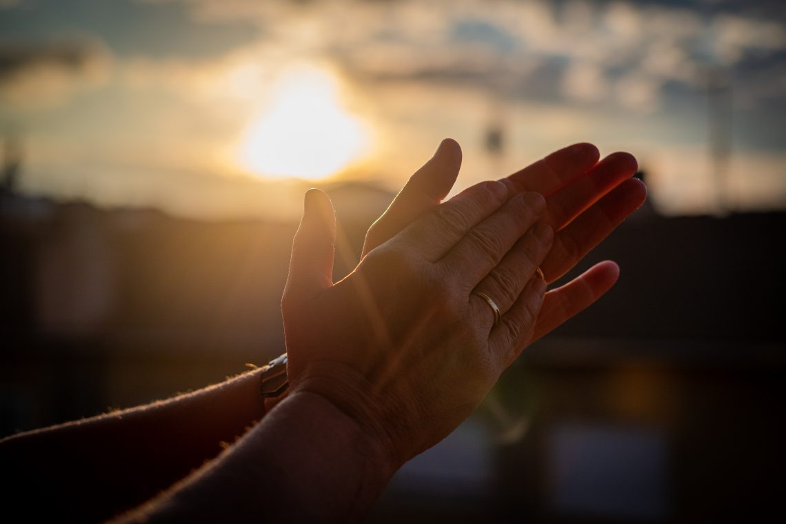 persons left hand with silver ring