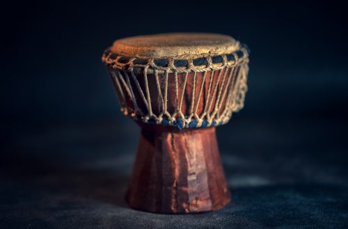 selective focus photography of brown djembe instrument