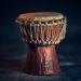selective focus photography of brown djembe instrument