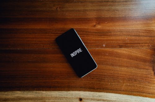 black and white box on brown wooden table