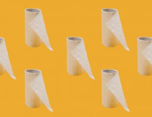 white tissue paper roll on yellow background