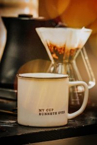 white ceramic mug with coffee