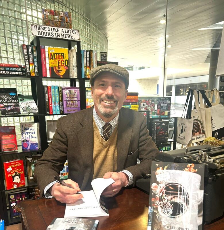 Author Robert Piazza signing his book of poetry